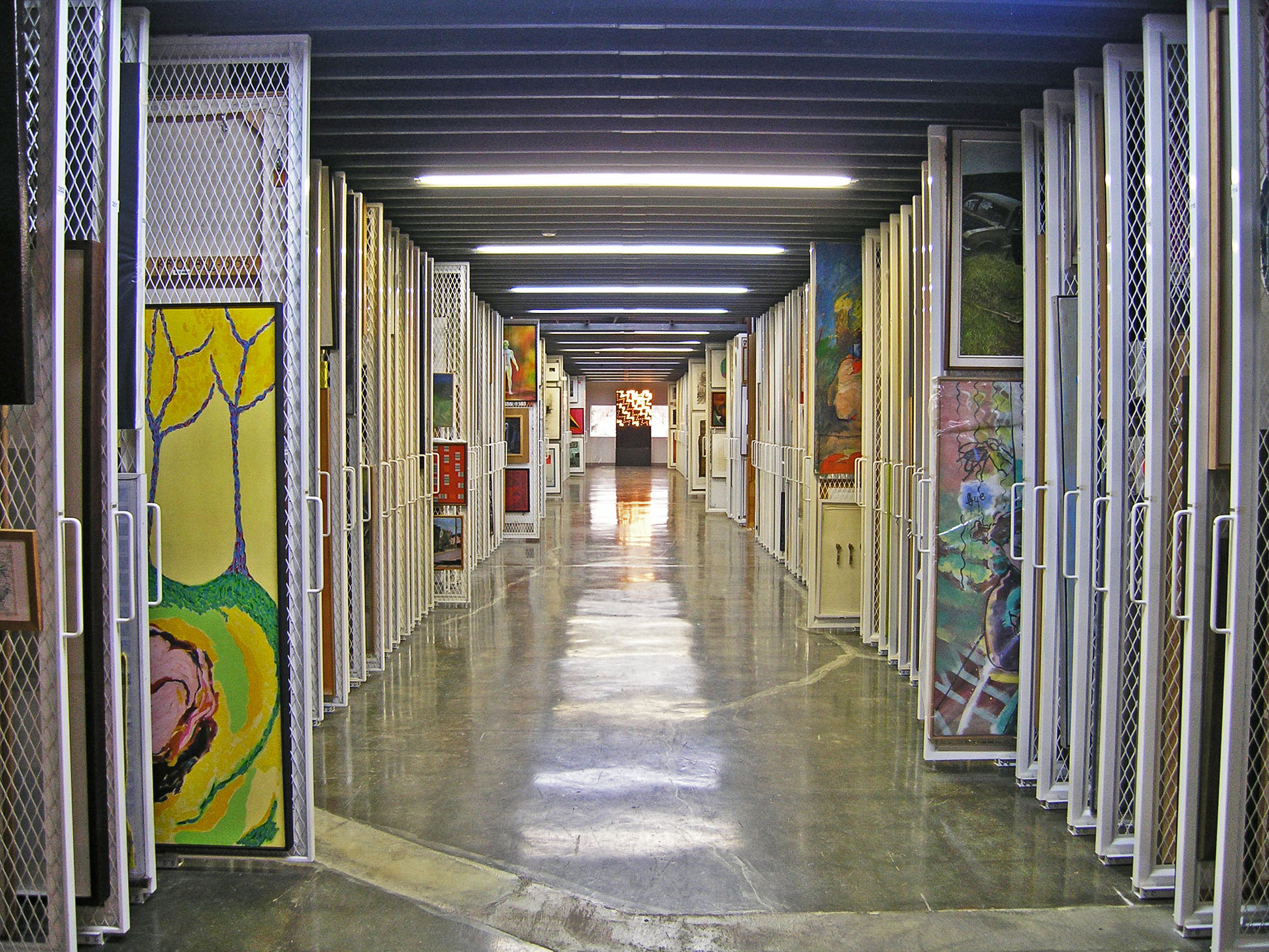 Interior view of the Canada Council's art collection storage area featuring thousands of paintings.