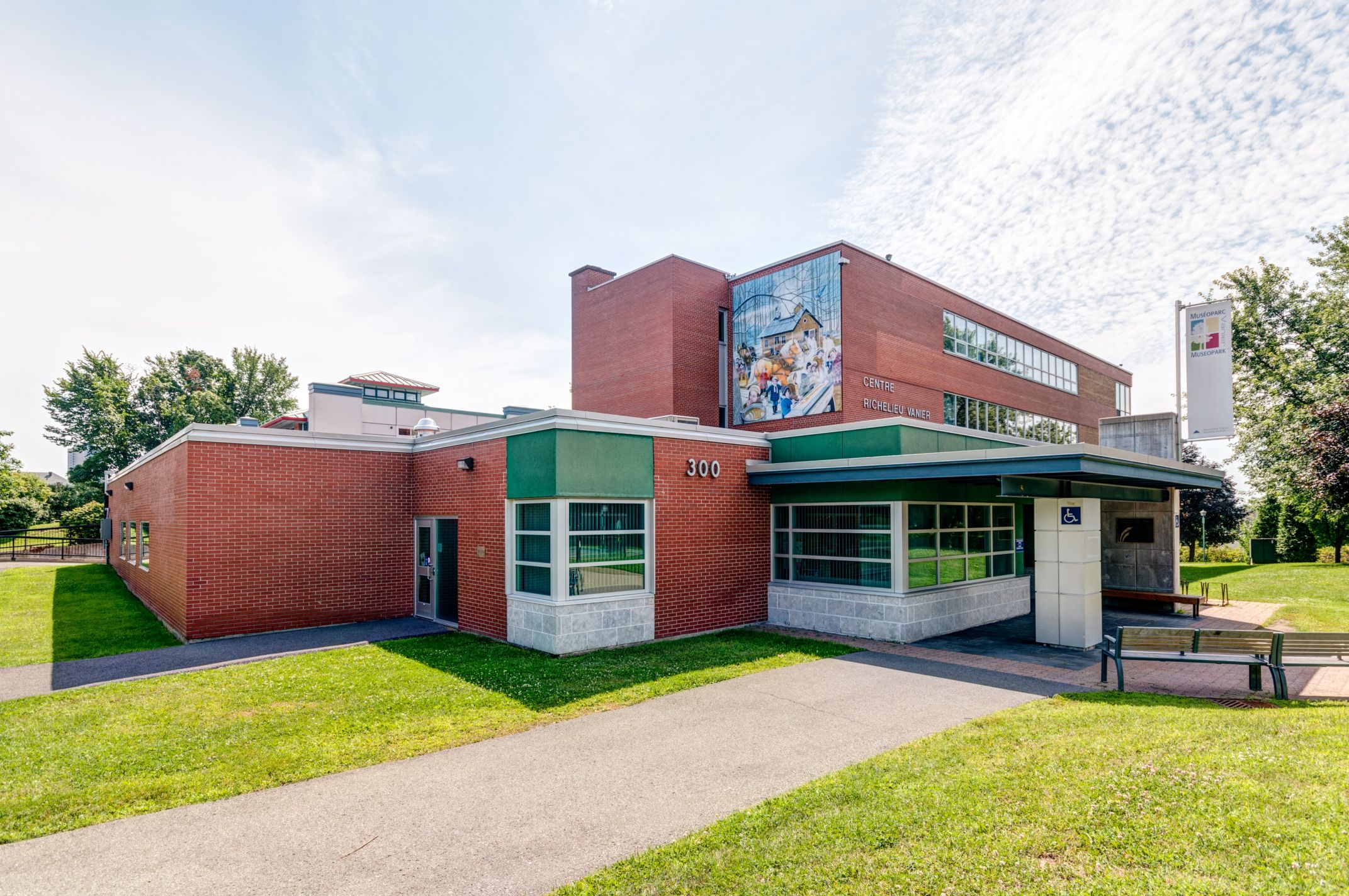 Exterior view of a red-brick community centre that is home to the Vanier Museopark.